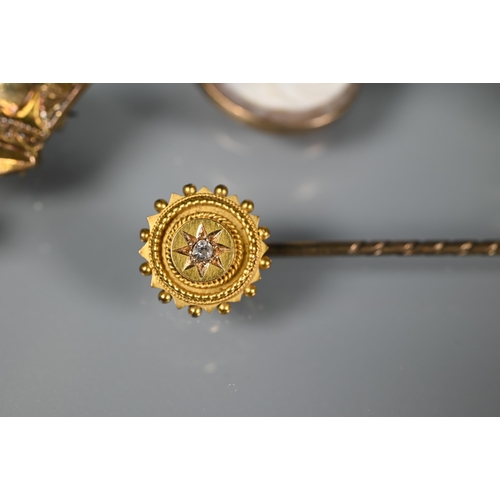 294A - Four various brooches - a 9ct yellow gold coronet brooch (3.4g), a white metal naval lapel badge, a ... 