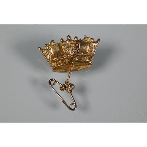 294A - Four various brooches - a 9ct yellow gold coronet brooch (3.4g), a white metal naval lapel badge, a ... 