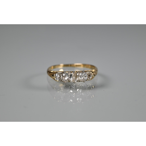 296 - A five stone diamond ring, the graduated old cut diamonds set unmarked yellow metal, size O; a three... 