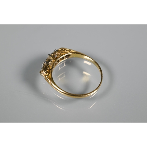 296 - A five stone diamond ring, the graduated old cut diamonds set unmarked yellow metal, size O; a three... 