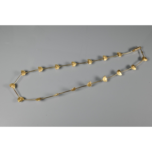 299A - Graham Stewart - An 18ct gold necklace formed of stylised tulip heads with rod links, 21.9g, in orig... 