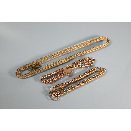 303 - A 9ct rose gold curb bracelet, 15.7g; a gilt metal curb bracelet and an unmarked wheat link chain (3... 