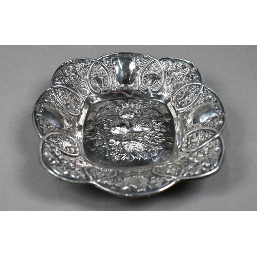 31 - A Lisham Art (Israel) 925 dish of lobed square form, embossed and chased with fruit and flowers, 4.7... 