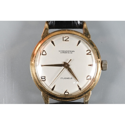 310 - Winegartens, London, two gents vintage wristwatches - one 9ct gold cased manual, champagne dial, run... 