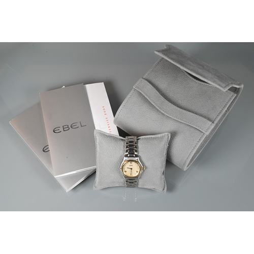 311 - An Ebel ladies 1911 model stainless steel and 18ct gold wristwatch, the mother of pearl dial set wit... 