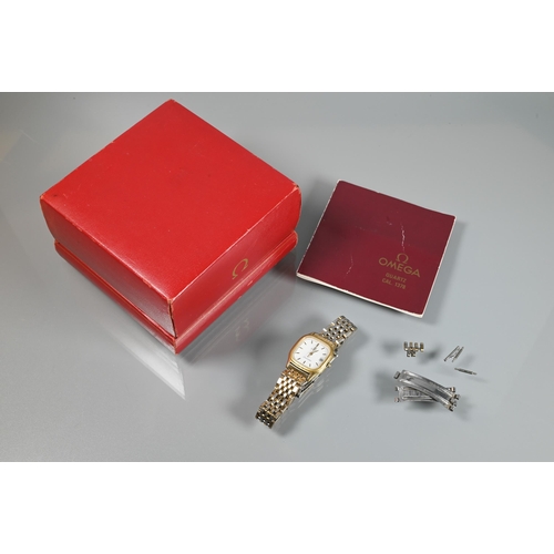 312 - A ladies Omega Seamaster 1378 quartz wristwatch, the gold case with white dial and gilt baton marker... 