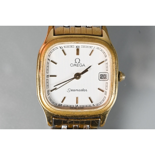 312 - A ladies Omega Seamaster 1378 quartz wristwatch, the gold case with white dial and gilt baton marker... 