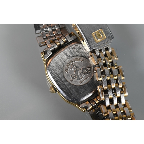 312 - A ladies Omega Seamaster 1378 quartz wristwatch, the gold case with white dial and gilt baton marker... 