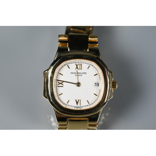 320 - A ladies Patek Phillipe Nautilus 18ct yellow gold bracelet wristwatch, quartz, ref. 4700J, No. 15307... 