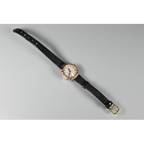 321 - A ladies 9ct Art Deco period wristwatch, the silvered engine turned dial with Roman numerals, manual... 