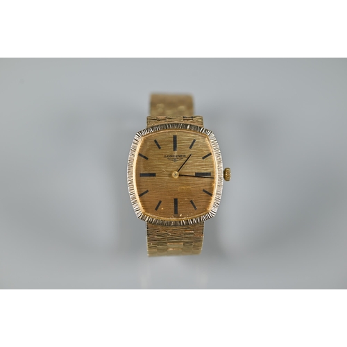 329 - A gents Longines 9ct gold manual wind wristwatch, the rounded rectangular gold dial signed 'Longines... 