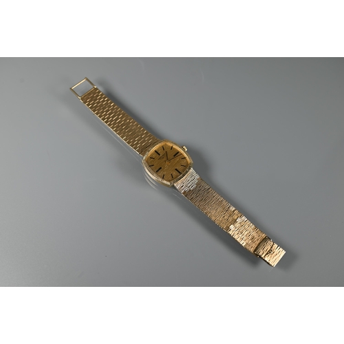 329 - A gents Longines 9ct gold manual wind wristwatch, the rounded rectangular gold dial signed 'Longines... 