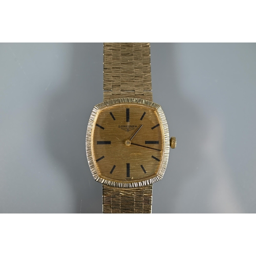 329 - A gents Longines 9ct gold manual wind wristwatch, the rounded rectangular gold dial signed 'Longines... 