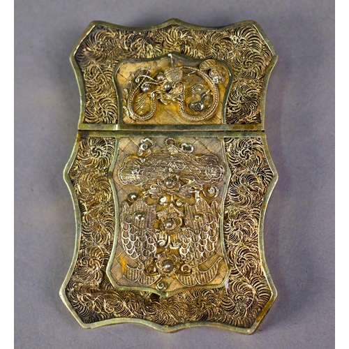 33 - An antique Chinese gilt metal filigree visiting card case with applied dragon and fish motifs, 10 x ... 