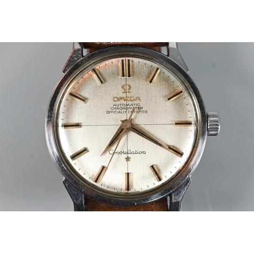 335 - A vintage gents Omega Constellation, automatic chronometer, stainless steel  with silvered dial and ... 