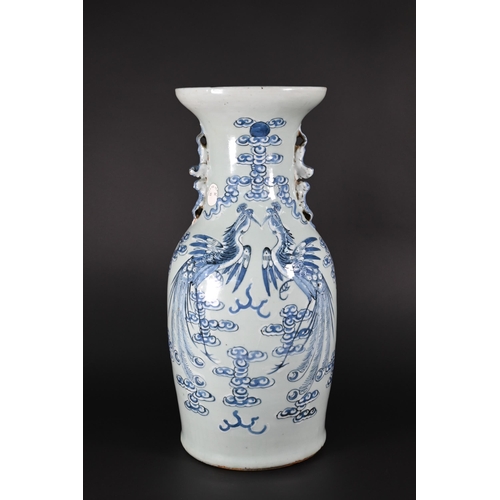 350 - A 19th century Chinese baluster vase applied with guardian lions, the neck painted in underglaze blu... 