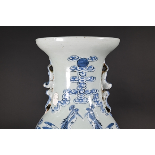 350 - A 19th century Chinese baluster vase applied with guardian lions, the neck painted in underglaze blu... 