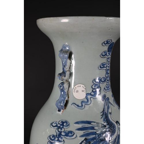 350 - A 19th century Chinese baluster vase applied with guardian lions, the neck painted in underglaze blu... 