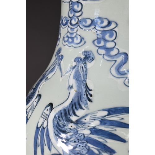 350 - A 19th century Chinese baluster vase applied with guardian lions, the neck painted in underglaze blu... 