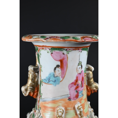 353 - A pair of 19th century Chinese Canton famille rose vases, late Qing dynasty, each applied with mould... 