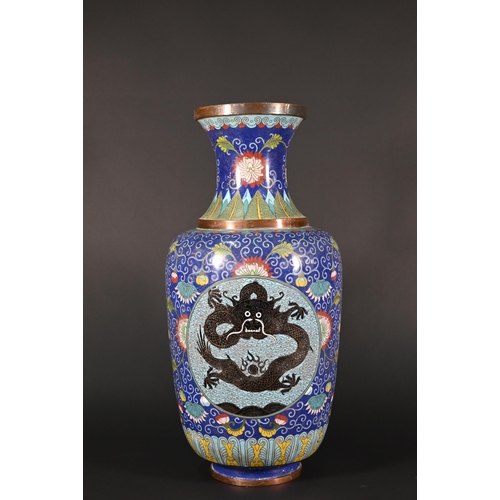 355 - A 20th century Chinese blue ground cloisonne baluster vase with dragon roundels and polychrome ename... 