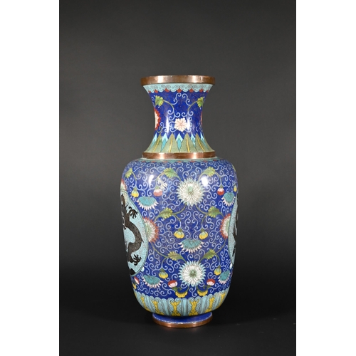 355 - A 20th century Chinese blue ground cloisonne baluster vase with dragon roundels and polychrome ename... 