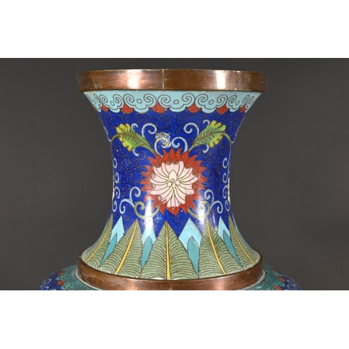 355 - A 20th century Chinese blue ground cloisonne baluster vase with dragon roundels and polychrome ename... 