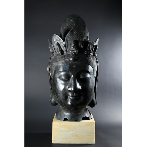 357 - A Himalayan patinated bronze crowned head of  Ksitigarbha (translated as 'earth treasury' or 'earth ... 