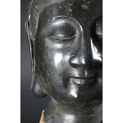 357 - A Himalayan patinated bronze crowned head of  Ksitigarbha (translated as 'earth treasury' or 'earth ... 