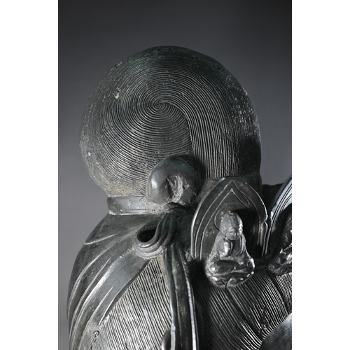 357 - A Himalayan patinated bronze crowned head of  Ksitigarbha (translated as 'earth treasury' or 'earth ... 