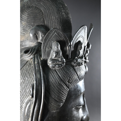 357 - A Himalayan patinated bronze crowned head of  Ksitigarbha (translated as 'earth treasury' or 'earth ... 