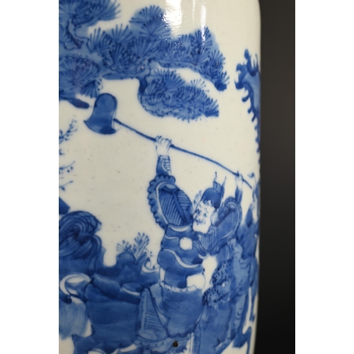 362 - A Chinese Kangxi style blue and white rouleau vase painted in rich tones of underglaze blue with a c... 