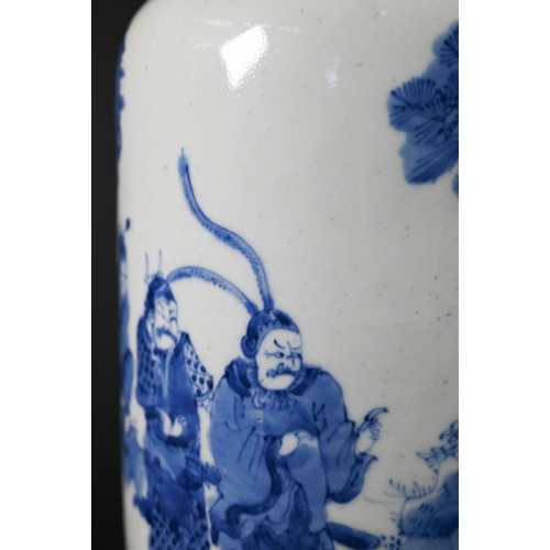 362 - A Chinese Kangxi style blue and white rouleau vase painted in rich tones of underglaze blue with a c... 