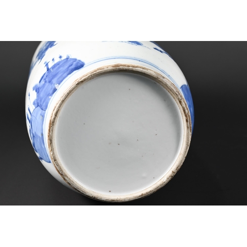 362 - A Chinese Kangxi style blue and white rouleau vase painted in rich tones of underglaze blue with a c... 