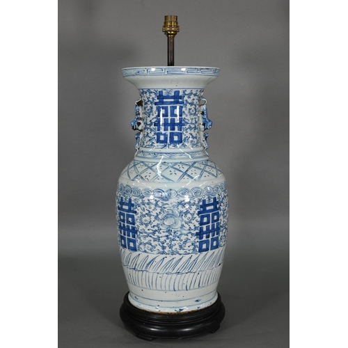 363 - A pair of 19th century Chinese blue and white lamp mounted wedding vases, painted with floral scroll... 