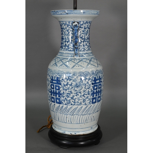 363 - A pair of 19th century Chinese blue and white lamp mounted wedding vases, painted with floral scroll... 