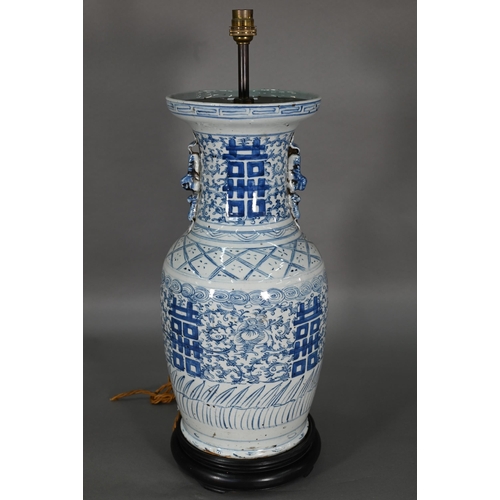 363 - A pair of 19th century Chinese blue and white lamp mounted wedding vases, painted with floral scroll... 