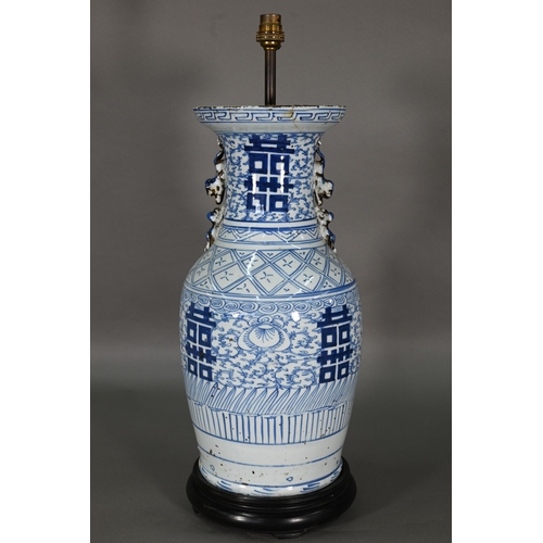 363 - A pair of 19th century Chinese blue and white lamp mounted wedding vases, painted with floral scroll... 