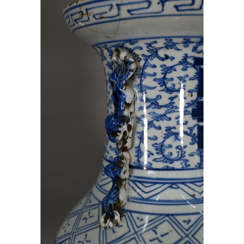 363 - A pair of 19th century Chinese blue and white lamp mounted wedding vases, painted with floral scroll... 