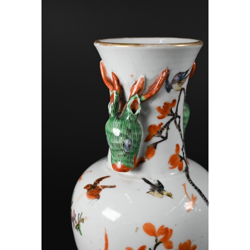 364 - A small 19th century Chinese famille rose baluster vase applied with gilded rim and moulded stag hea... 