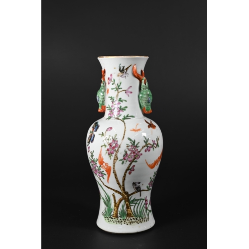 364 - A small 19th century Chinese famille rose baluster vase applied with gilded rim and moulded stag hea... 