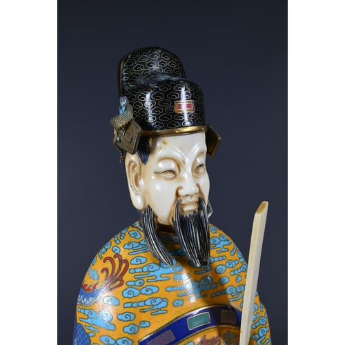 365 - An early 20th century Chinese cloisonne figure of a Daoist deity, possibly Wenchang Wang (God of Cul... 