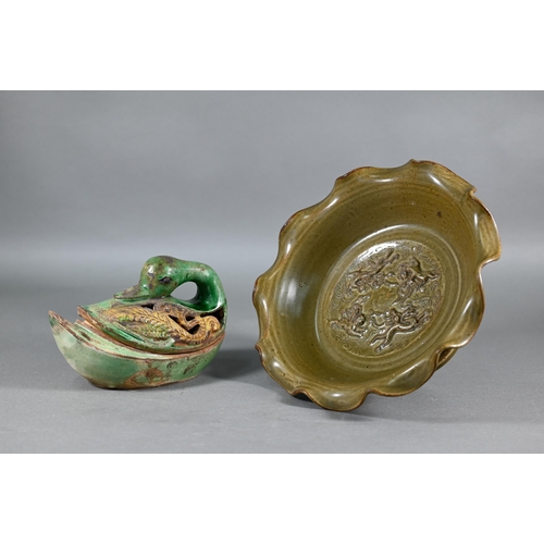 368 - A Chinese Song style stemmed fruit dish with olive green glaze and relief mythical beast decoration,... 