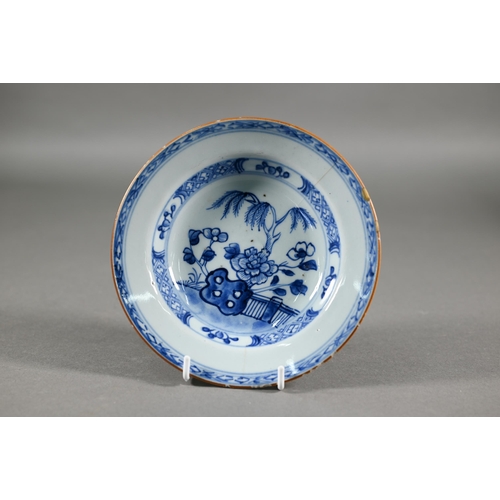 369 - A group of 18th century Chinese blue and white ceramics including a Kangxi period dragon and carp pl... 