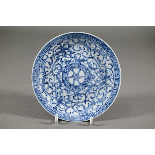 369 - A group of 18th century Chinese blue and white ceramics including a Kangxi period dragon and carp pl... 