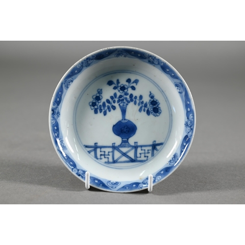 369 - A group of 18th century Chinese blue and white ceramics including a Kangxi period dragon and carp pl... 