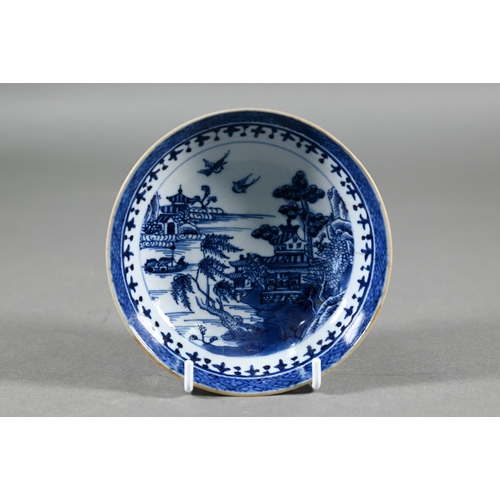 369 - A group of 18th century Chinese blue and white ceramics including a Kangxi period dragon and carp pl... 