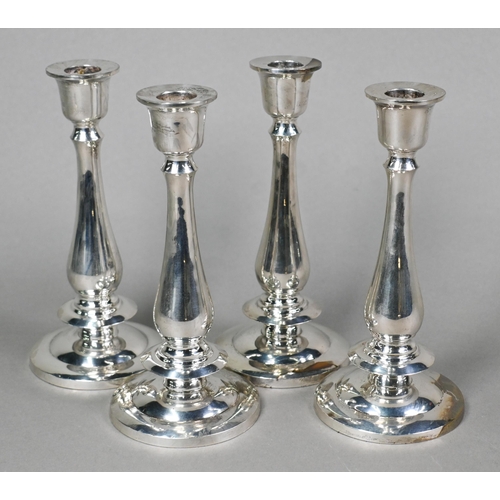 37 - A set of four loaded foreign silver baluster candlesticks on circular bases, stamped 'Thailand 925 S... 