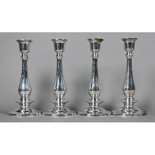 37 - A set of four loaded foreign silver baluster candlesticks on circular bases, stamped 'Thailand 925 S... 