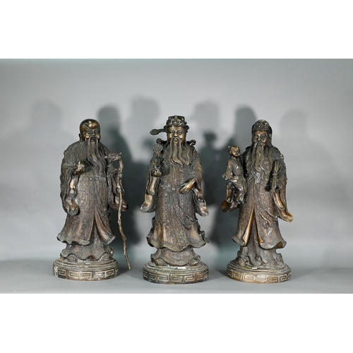 375 - Three large Chinese bronze 'Star Gods' (Sanxing) Fu, the personification of good fortune, depicted i... 